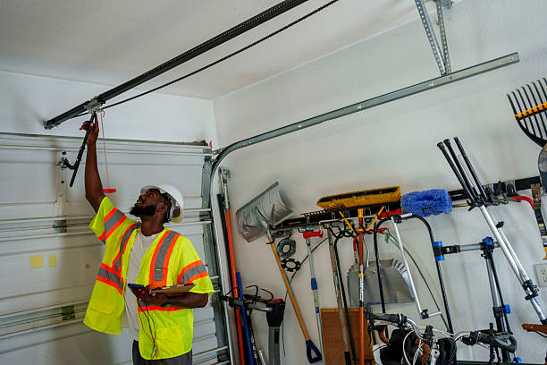 Professional Garage Door Panel Replacement technician working in Fort Totten, ND